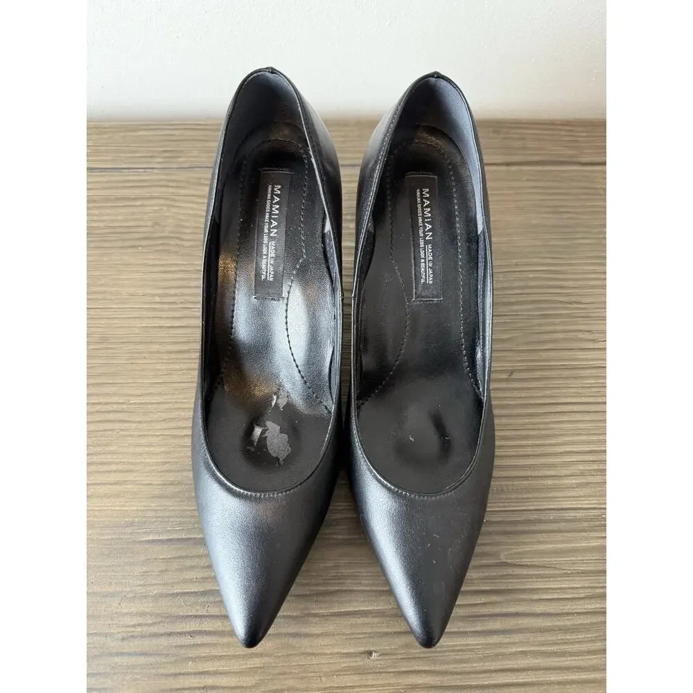Mamian black pumps